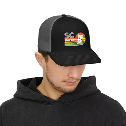 Sunset Surf Trucker Cap — Retro SC Surfer Patch Snapback